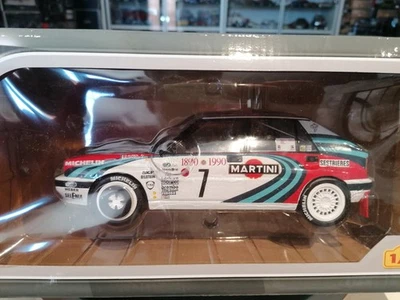 Ixo 1/18 Lancia Delta HF Rally 4WD 16v Auriol Occelli Winner Montecarlo 1990 Box - Immagine 1 di 4
