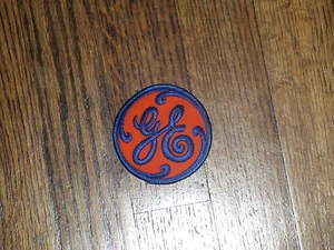 general electric (ge), fondo naranja/letras azules, 2,75"x2,75", nos, años 60 - Imagen 1 de 1