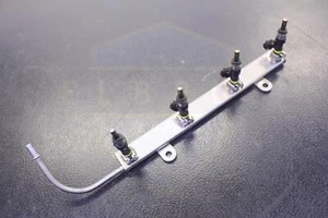 MITSUBISHI LANCER 2.0L 2.4L 12 13 14 15 16 17 FUEL INJECTION RAIL W/ INJECTORS - Picture 1 of 5