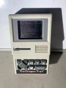 The OREGON TRAIL Handheld Electronic Video Game 09597 2017 TESTED WORKS - Picture 1 of 2