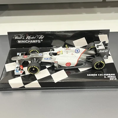MINICHAMPS 1/43 Sauber C31-Ferrari Sergio Perez 2012 NEC #15 Checo 410120015 - Image 1 of 4