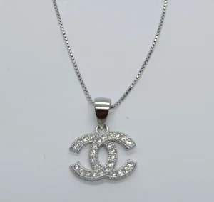 Ciondolo E collana in argento 925 rodiato modello c zirconi bianchi - Foto 1 di 6
