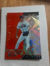 1998 Pinnacle Epix Moment Orange E21 Greg Maddux 