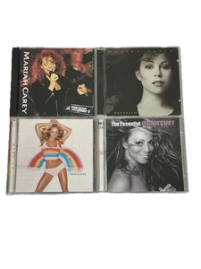 Mariah Carey 4 CD Lot - MTV Unplugged, Daydream, Rainbow, The Essential (2 CDs) - Bild 1 von 9