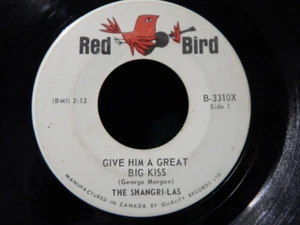 The Shangri-Las - Give Him A Great Big Kiss (7", Single) (Very Good Plus (VG+))  - Bild 1 von 2