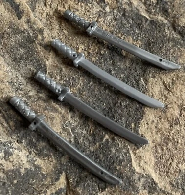 Lote de espadas Lego color plata. Usado Foto 1 de 3