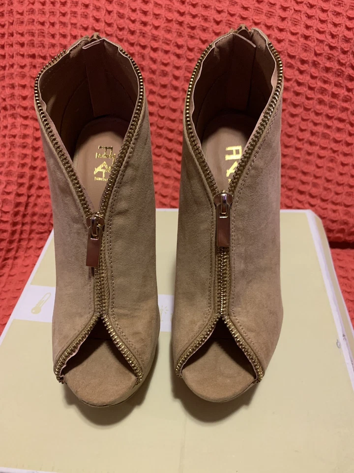 Botines WMNS color tostado talla 6,5 Foto 1 de 4