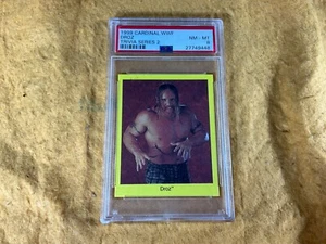 TARJETA DE LUCHA LIBRE O11-79 - DROZ - 1999 CARDINAL WWF - TRIVIA SERIE 2 - PSA GRADO 8 - Imagen 1 de 6