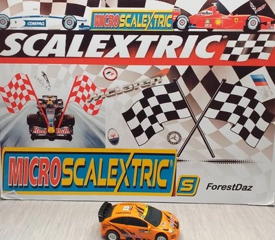 Micro Scalextric Ford Focus Rally Car #11 Toko Racing Orange 1:64 Scale 12V Used - Image 1 of 4