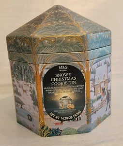 Caja de música navideña nevada Marks & Spencer lata de galletas con proyector de luz giratorio - Imagen 1 de 9