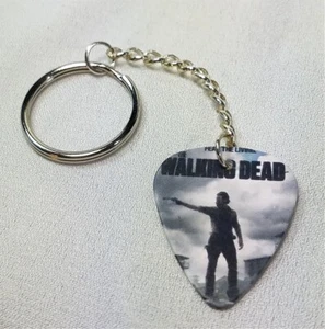 The Walking Dead Rick Grimes Pointing His Gun Guitar Pick Keychain - Picture 1 of 2