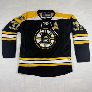 Camiseta deportiva Boston Bruins Bergeron Reebok Edge 2.0 negra local juego emitida 50 2013 - Imagen 1 de 9