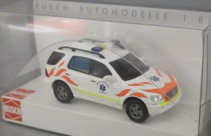 Busch 48541 Mercedes Benz M-Class Ambulanza Lausanne HO 1:87 NUOVO - Foto 1 di 1