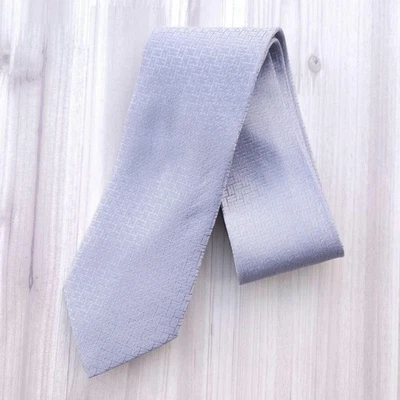 Corbata de Seda Hermes Fassonné Patrón H Gris Claro 100% Seda Usada Foto 1 de 4