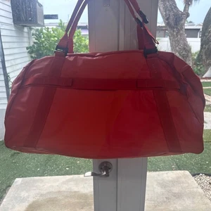 ✈️ BRAND NEW - AWAY ACTIVE DUFFLE BAG 55L - Red  ✈️  READY TO TRAVEL - Picture 1 of 4