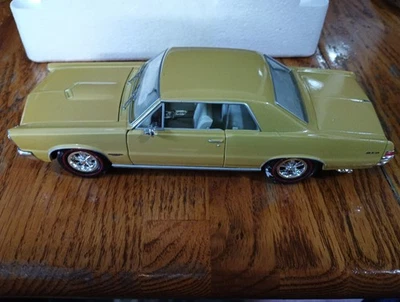 Welly 1965 Pontiac GTO 1/26 Scale Model Car #2092 Gold - Image 1 of 4