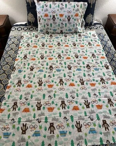 Carter's Three Piece Crib Sheet Set Flat~Fitted~Pillowcase Bear Raccoon Bike - Picture 1 of 7