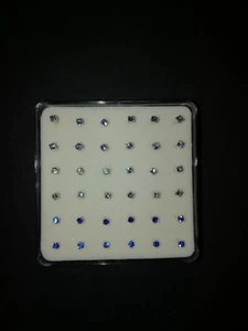 Confezione Da 36 Orecchini Per Naso In Argento 800/925 con brillantino scala blu - Foto 1 di 2