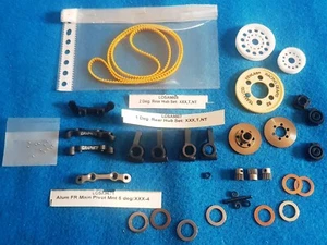 Lot of Team Losi XXX4 (XXX-4) new parts (Yellow Belt, Hub sets, Pivot, gears) - Photo 1/1