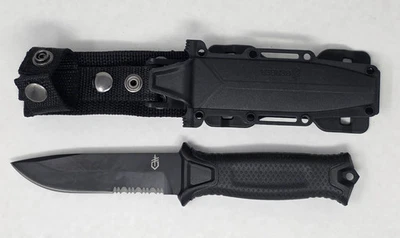 Cuchillo dentado de caza negro hoja fija camping Foto 1 de 4