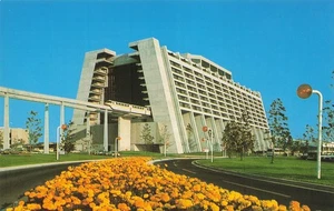 Walt Disney World Contemporary Resort Monorail Yellow Flowers FL Postcard - Picture 1 of 2