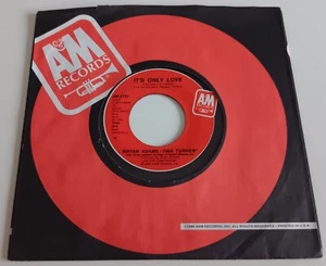 BRYAN ADAMS/ TINA TURNER - IT'S ONLY LOVE VINYL 45. PLAYS EX. USA ISSUE. - Picture 1 of 5