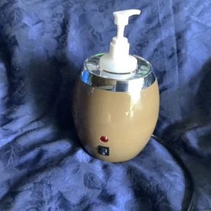 Massage oil heater model HQH1 – US - Picture 1 of 3