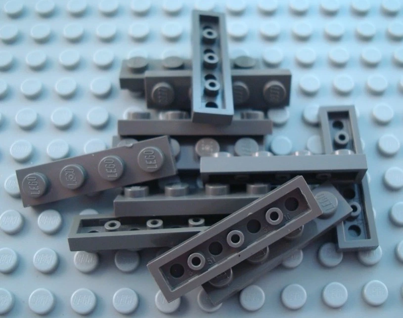 LEGO Lot of 12 Dark Gray 1x4 Plate Pieces - Image 1 of 1