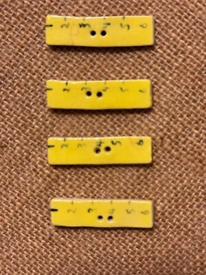 Set of 4 Yellow Ruler Motif Ceramic Buttons - Image 1 of 2