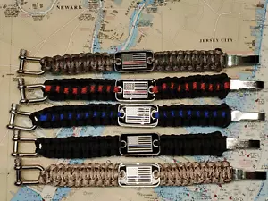 PARACORD SURVIVAL BRACELET WITH AN AMERICAN FLAG, POLICE, FIRE DEPARTMENT, NEW - Picture 1 of 12