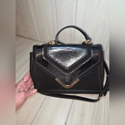 Bandolera Aldo Caland de cuero negro en relieve Foto 1 de 4