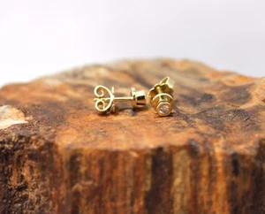 Gold Ohrstecker mit Diamanten besetzt, ca. 0.06ct (je Diamant), 585er Gelbgold - Bild 1 von 5