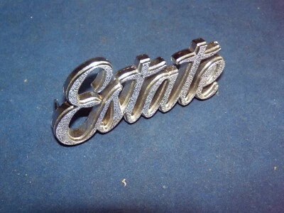 1973 1974 1975 1976? Guardabarros delantero emblema "Estate" Chevrolet El Camino NOS Foto 1 de 2
