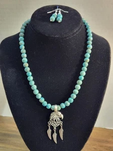 Set collana e orecchini giada africana riscaldati e tinti con ciondolo aquila in peltro  - Foto 1 di 24