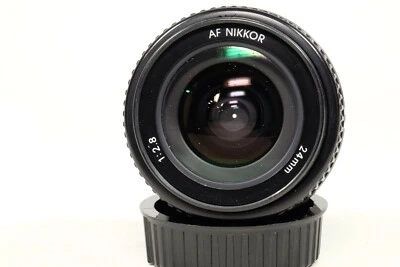 Nikon AF 24mm f2.8 lens with hood and caps - Image 1 of 4