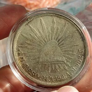 1898 Mo AM Mexico Cap & Rays Silver Peso China Restrike of 1949 Un Peso Coin - Picture 1 of 11