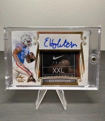 2023 Leaf Trinity Eli Holstein Rookie Patch Auto Gold Spectrum #'d /7 SSP RC - Image 1 of 3