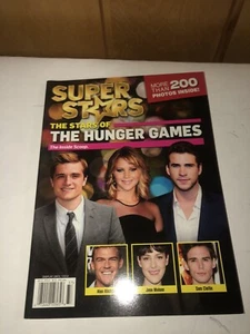 Magazine: Superstars: The Stars of The Hunger Games - Jennifer Lawrence - Liam - Picture 1 of 6