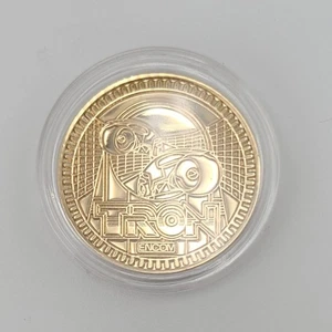 Moneda TRON Lightcycle Parque Disney Flynns Arcade Color Dorado Medallón de Metal WDW - Imagen 1 de 3