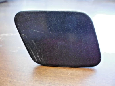 Cadillac STS 2006 - Tapón de arandela de faros de conductor izquierdo ***DESGASTE*** Foto 1 de 4