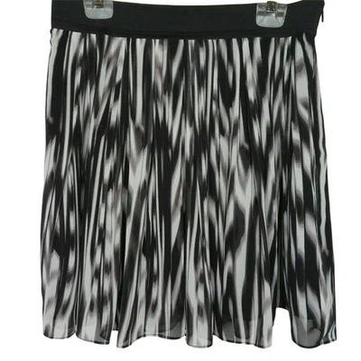Falda plisada con estampado de cebra Vince Camuto para mujer talla 12 negra blanca lateral de poliéster Foto 1 de 4