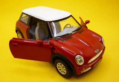 KINSMART NEW MINI COOPER DIECAST CAR 1:28 scale RED. - Image 1 of 4
