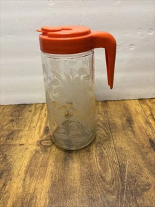 Jarra Anchor Hocking TANG 1 Qt vidrio grabado lirio naranja tapa de colección años 70 - Imagen 1 de 8