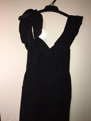 Black jumpsuit/ frilly shoulder sleeve - image 1 of 3