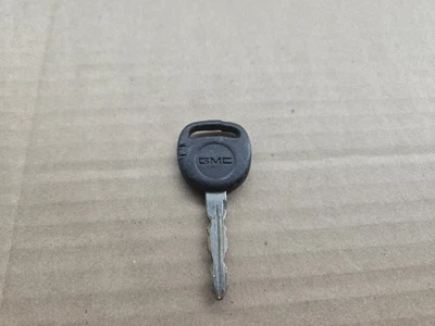Оригинальный заводской черный и хромированный ключ зажигания для двери GMC - Изображение 1 из 3