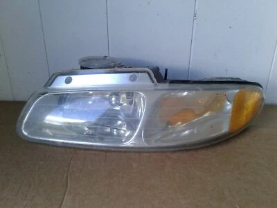 96-99 Dodge Caravan, faro lado conductor izquierdo Foto 1 de 4