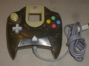 CONTROLADOR DE JUEGO OFICIAL SEGA DREAMCAST GRIS TRANSPARENTE ALMOHADILLA DE CONTROL DE HUMO HKT 7700 - Imagen 1 de 2
