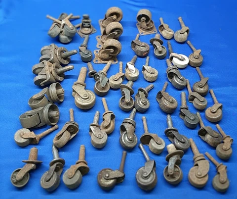 Large Lot of 48 Antique Caster Wheels for Vintage Furniture Repairs Steel Iron Cover