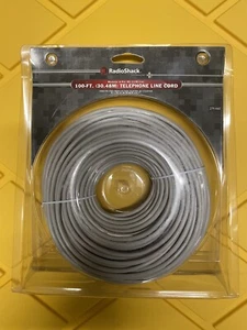 RadioShack 100-ft (30.48 Meters) Telephone RJ11/RJ14 Line Cord. Gray, Brand New! - Picture 1 of 4