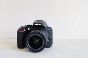Nikon D5600 with 18-55 VR lens, MINT +++. Shutter count 1637. Returns accepted. - Picture 1 of 8
